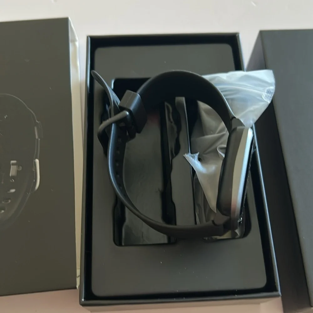 Black Smartwatch with Square Face and Active Display